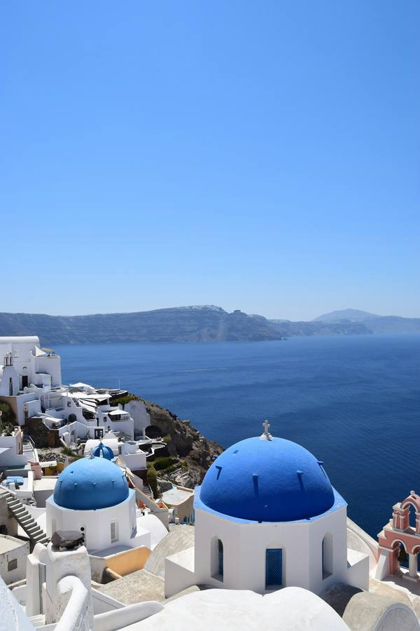 Blue-domed cliffside village, Santorini, Greece